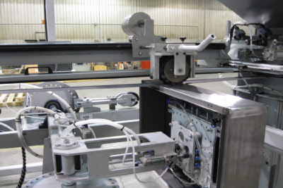 Contact wheel carriage on enclosure box stroke sander