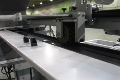 Industrial stroke sander with manual graphite pad